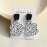 Boucles d’oreilles CS Violette