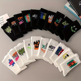 A Pack of Twenty Pairs of Mixed Color Graffiti Couple'S Mid-Calf Sports Socks.