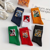 6 Pairs of Unisex Mid-Tube Socks – Trendy Hip Hop Street Style with Bold Graphic Designs (Navy Blue, Yellow, Red, White, Green, Black) for Men & Women, Perfect for Basketball, Casual Wear, and Everyday Comfort