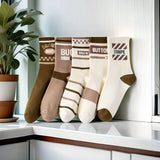 5 Pairs of Simple And Warm Mid-Calf Sports Socks for Spring, Summer, And Autumn for Both Men And Women.