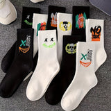A Pack of Twenty Pairs of Mixed Color Graffiti Couple'S Mid-Calf Sports Socks.